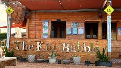 The Kite Bubble Beach Center Sign